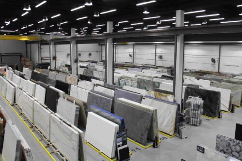 Marble slab warehouse with overhead lights